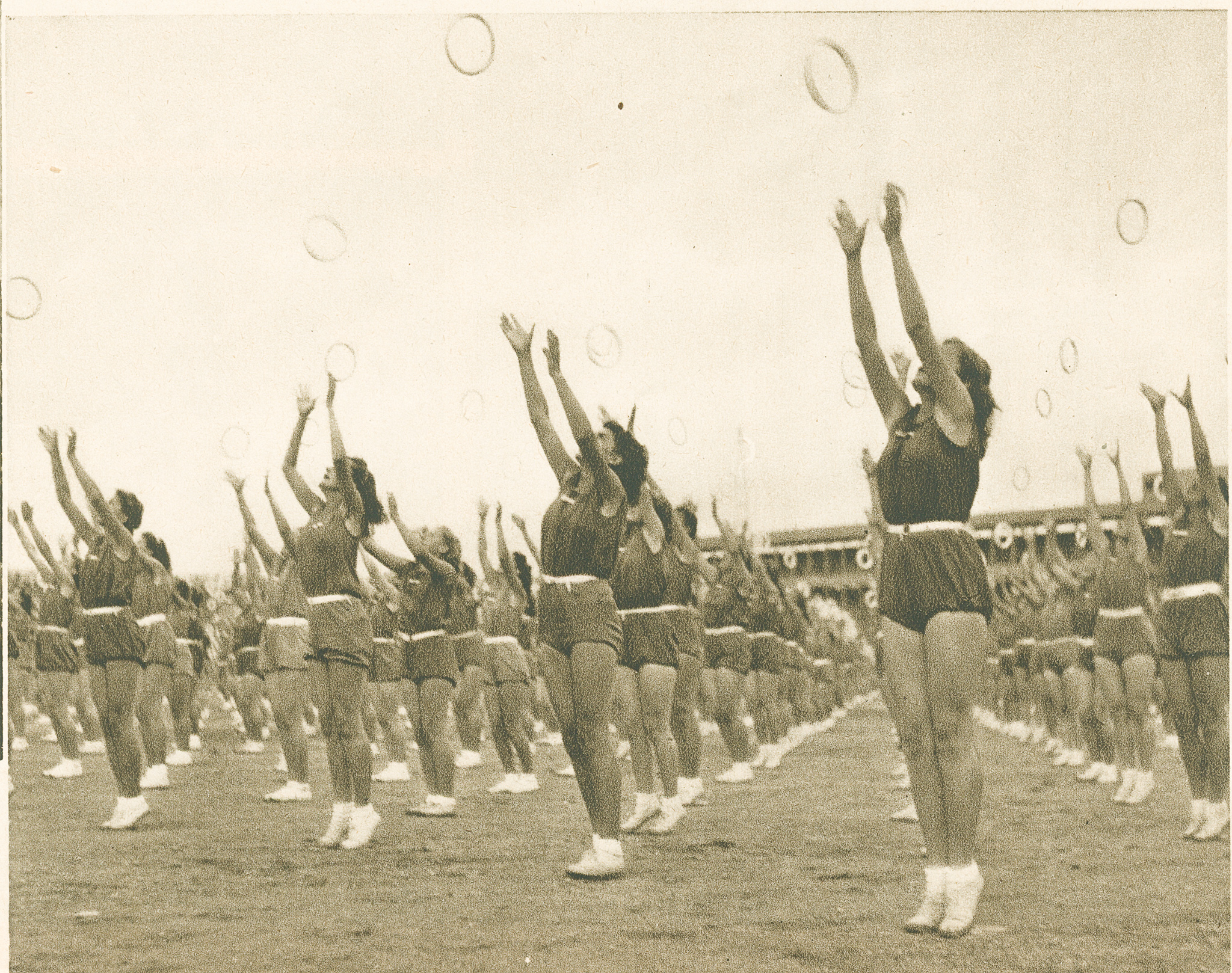 junior girls performing a drill using rings