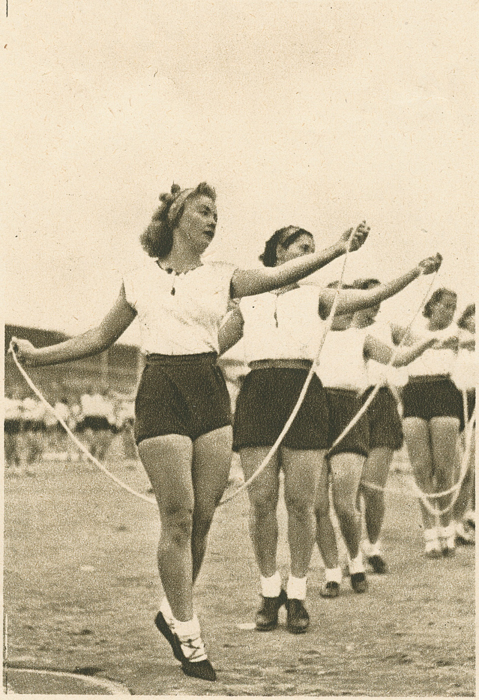 women performing a drill using ropes